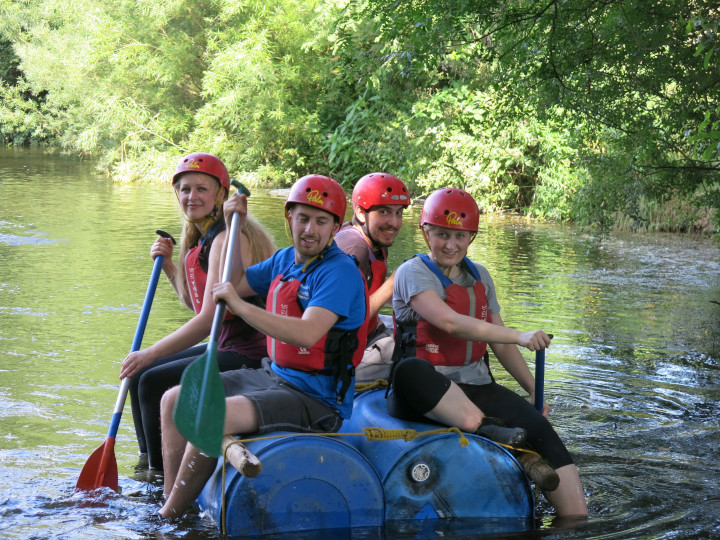 The team testing self-built rafts on the water